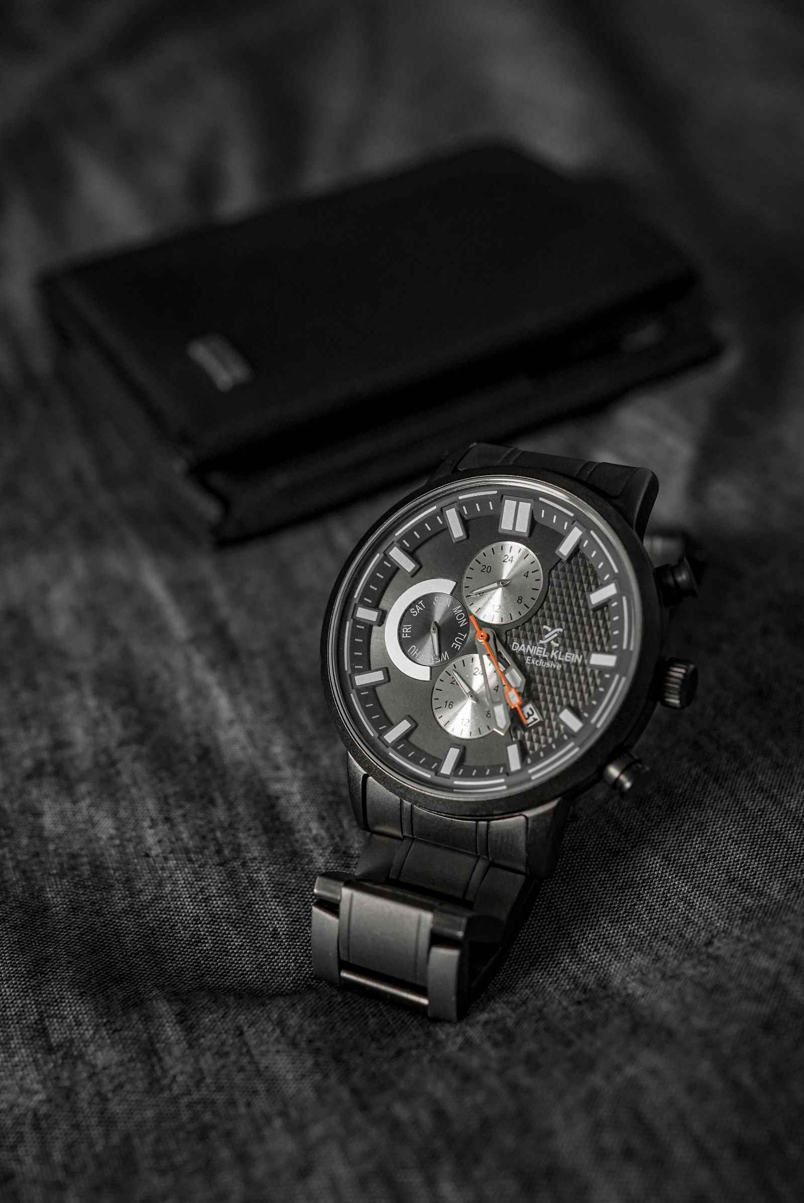 Black-dial wristwatch examined while learning how to spot a fake Rolex Explorer