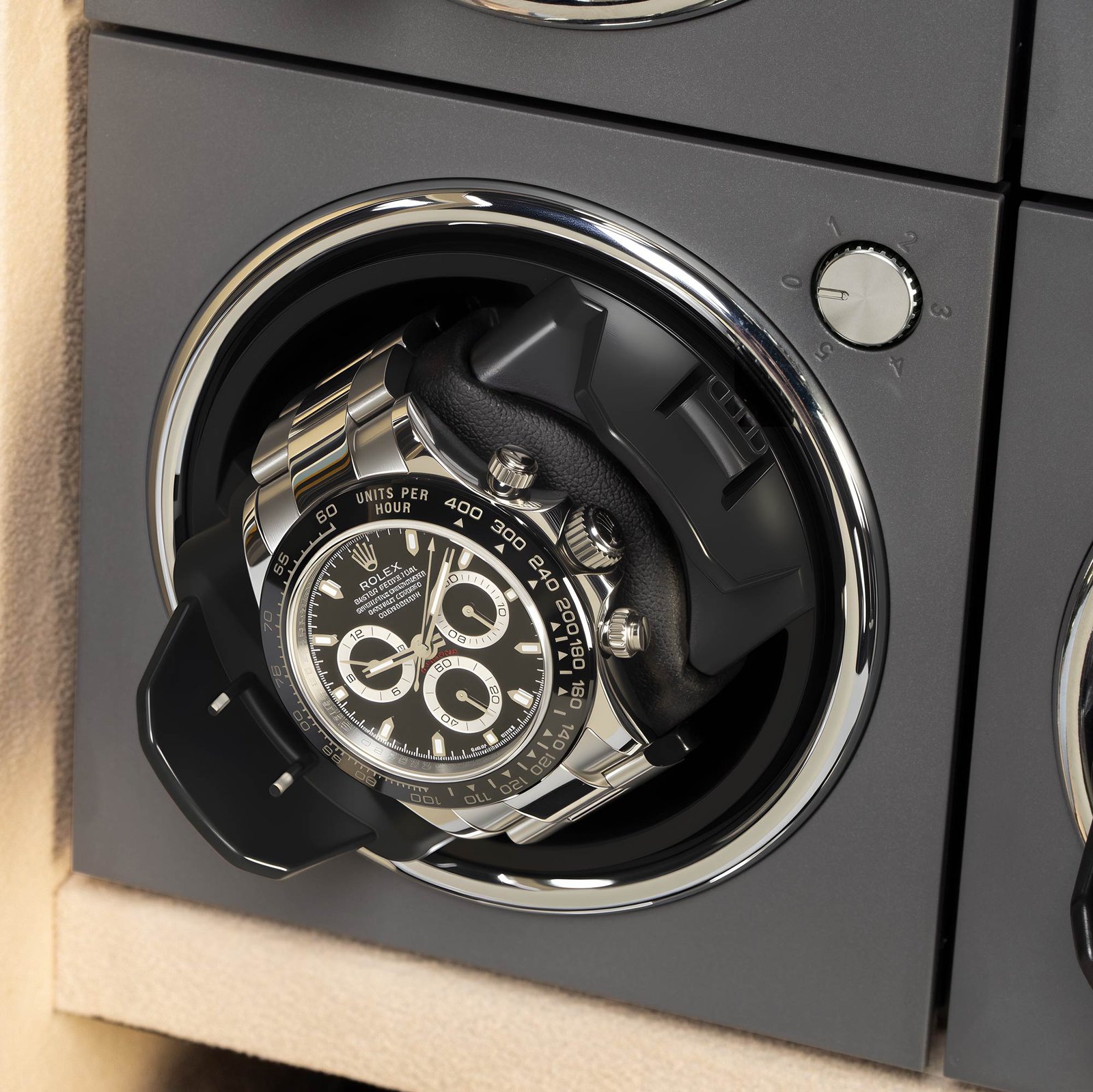 Close-up of GALOSOM watch winder module with automatic watch, chrome-finished winding ring and retractable control knob