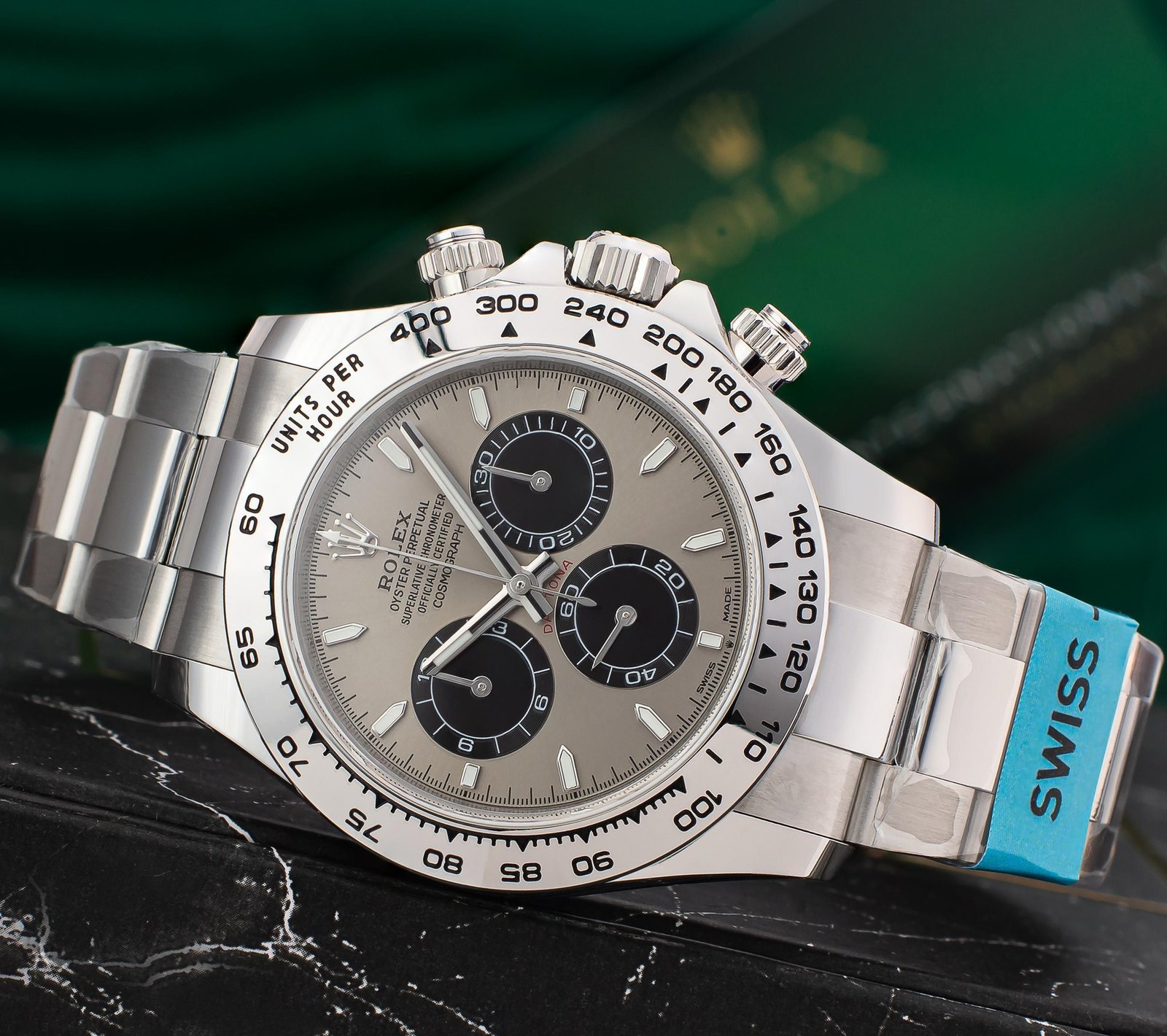 Luxury stainless steel wristwatch displayed upright for close inspection