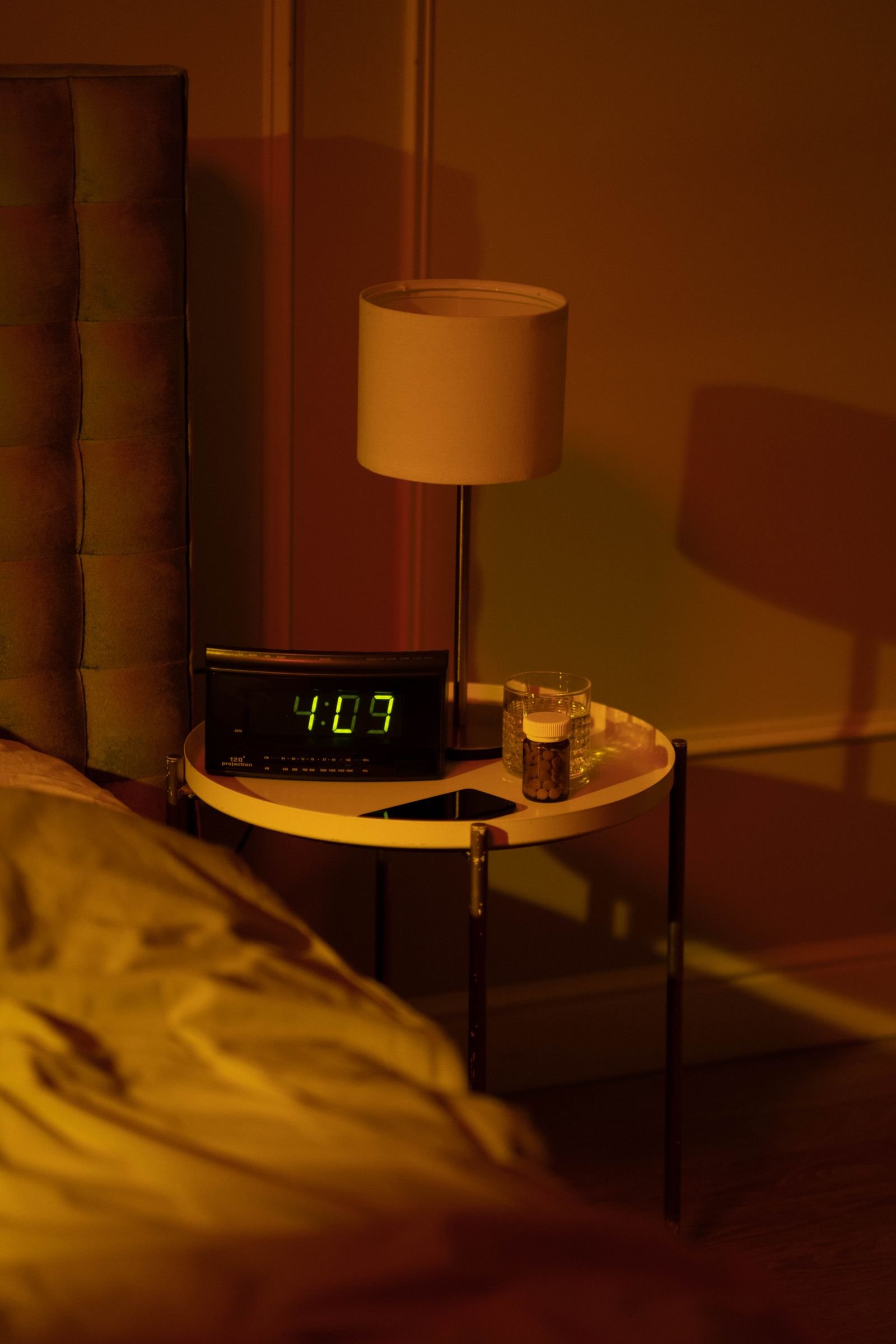 Nightstand clock representing repeatable overnight time-loss measurements