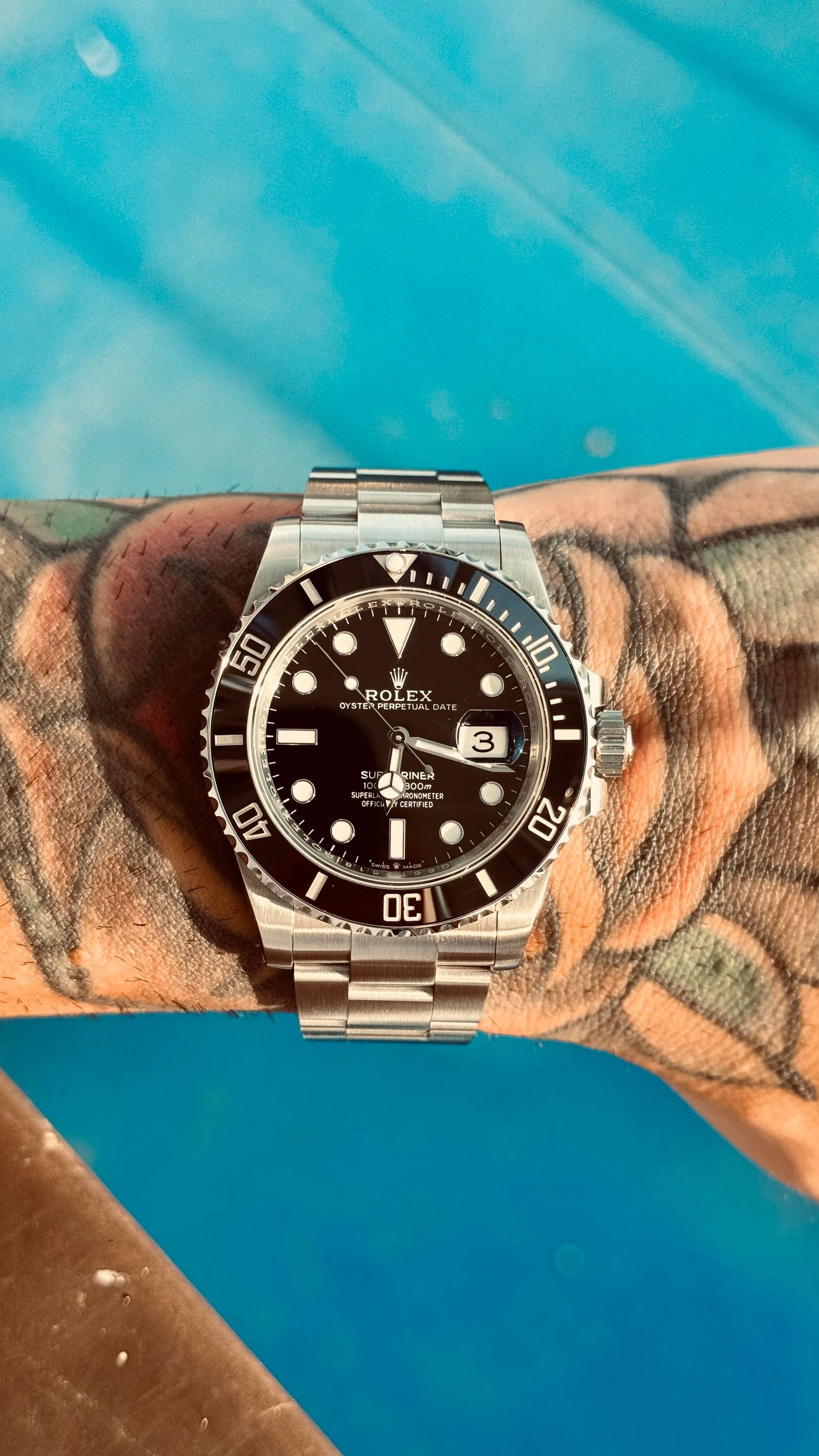 Mechanical wristwatch being observed in bright light for accuracy testing