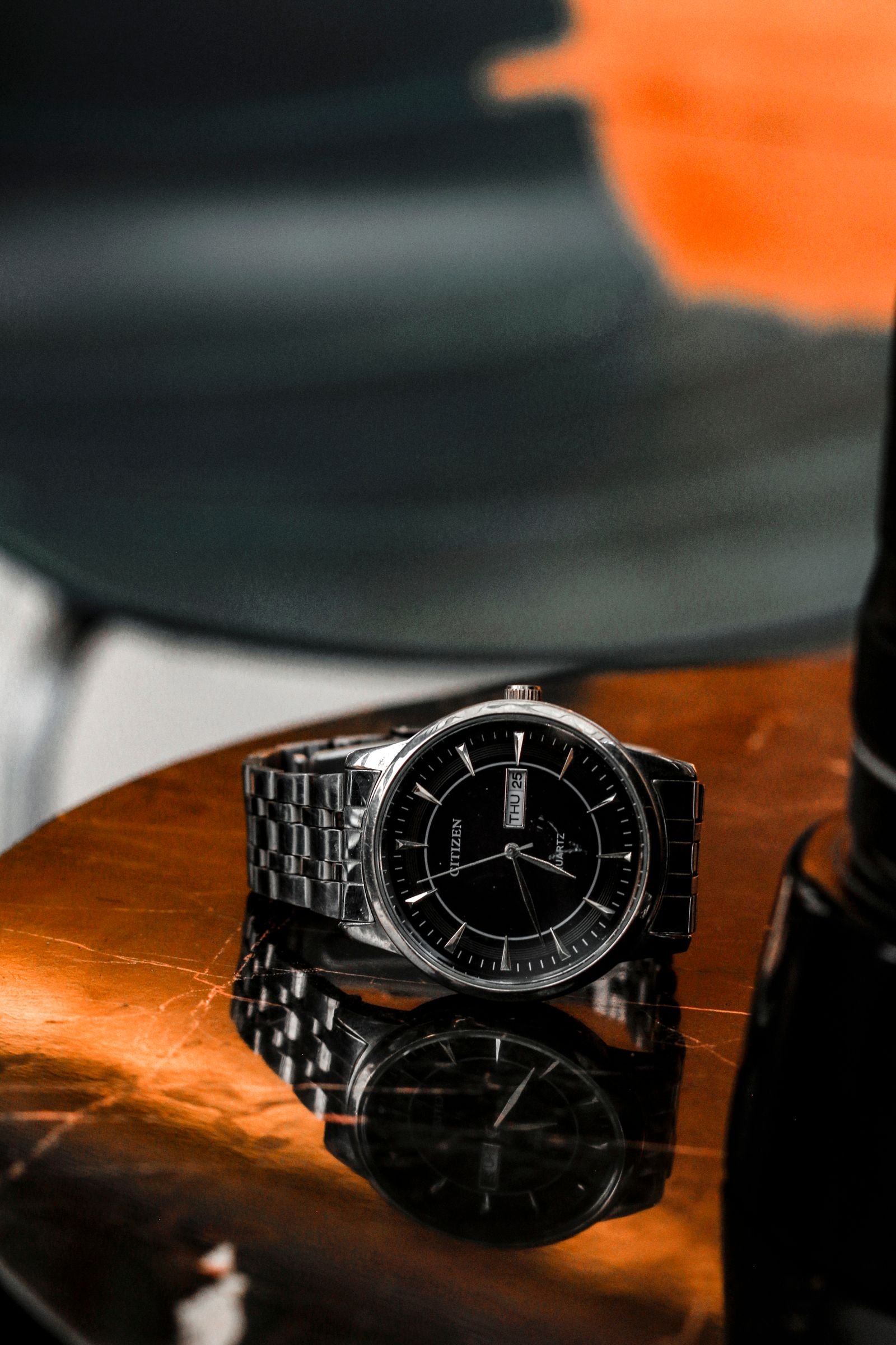 Mechanical watch placed safely on a table before professional inspection