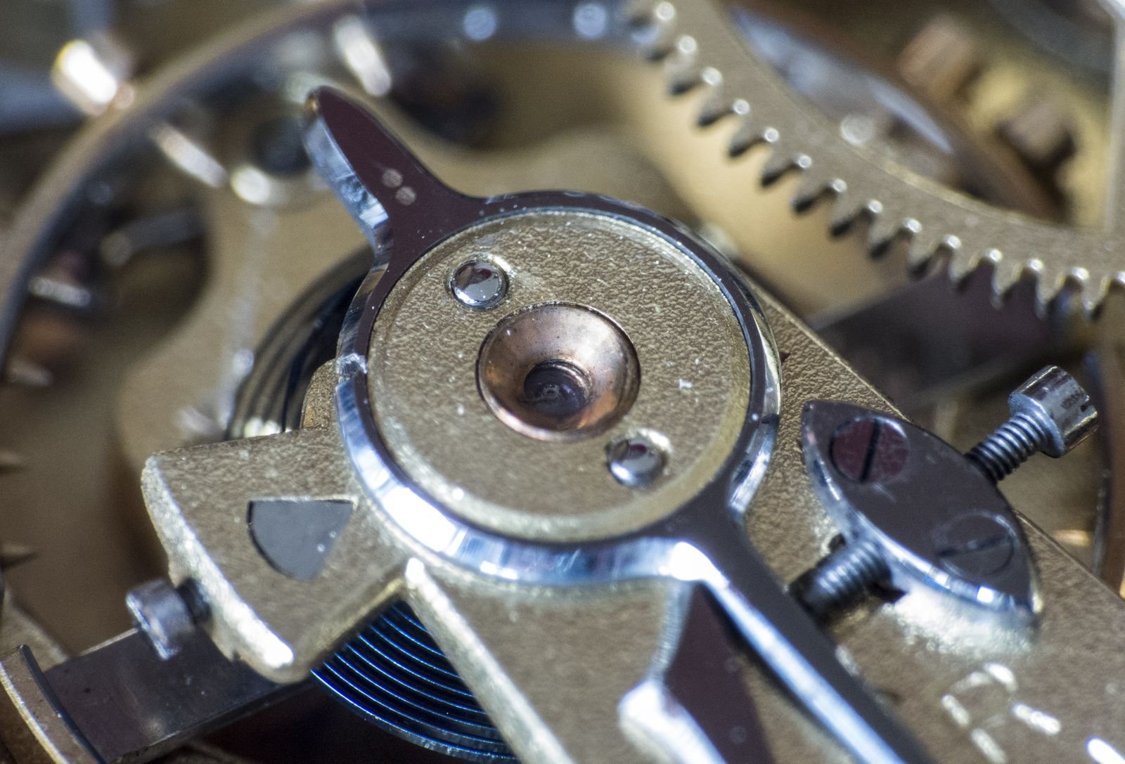 Macro view of mechanical watch gears and precision components