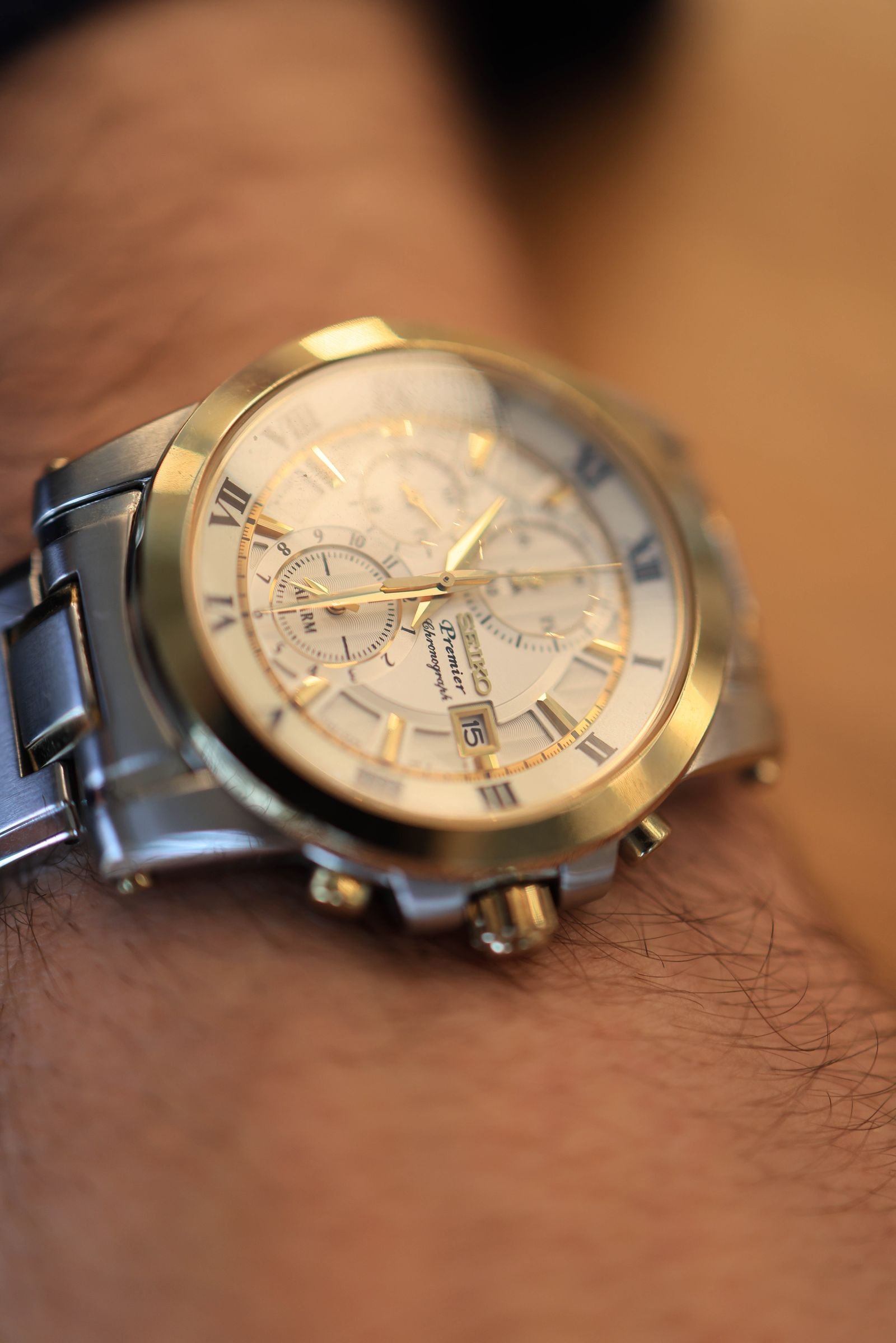 Automatic wristwatch being worn while its rotor winds the movement