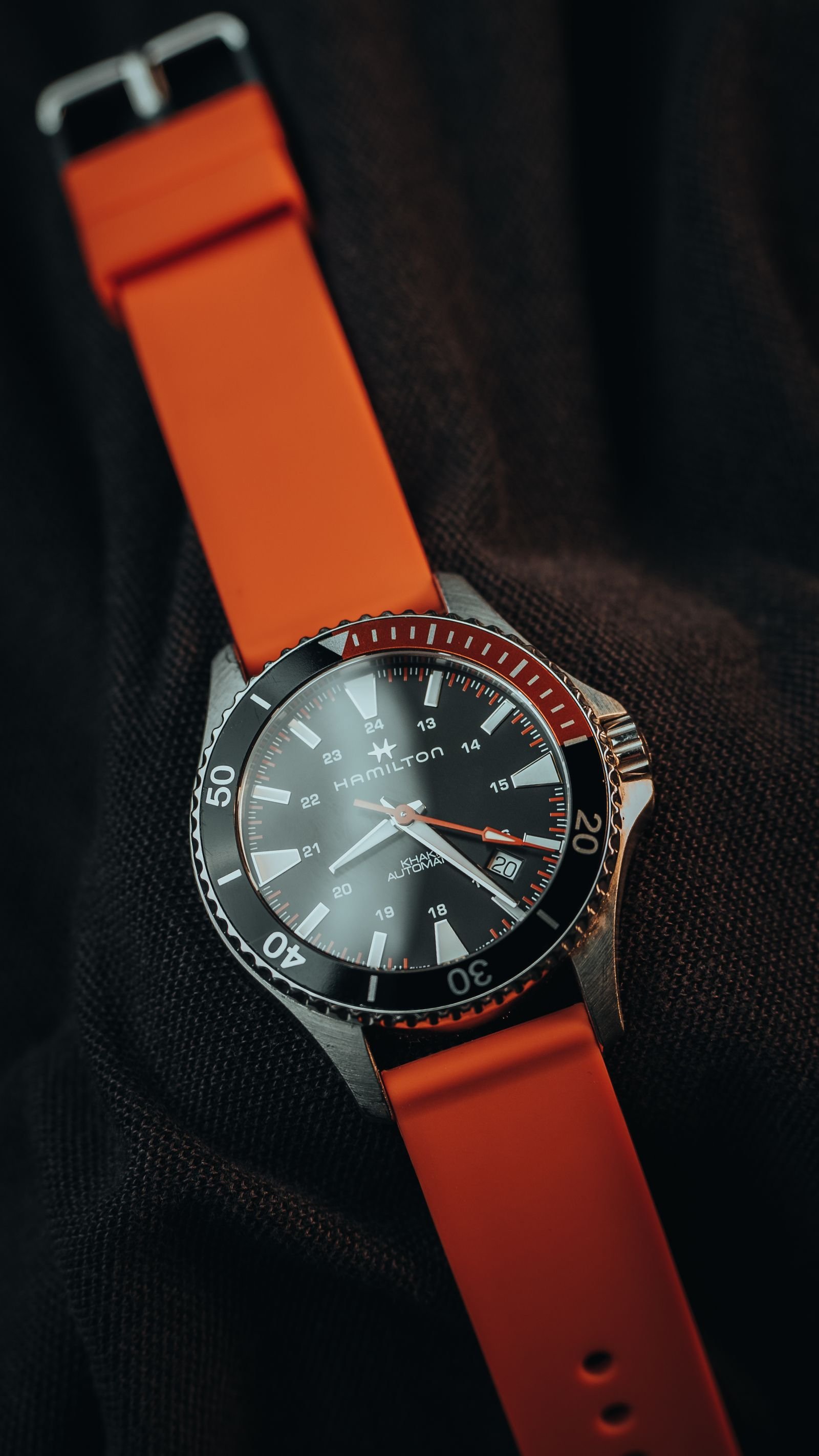 Close-up automatic watch dial used when confirming a Tudor model and calibre