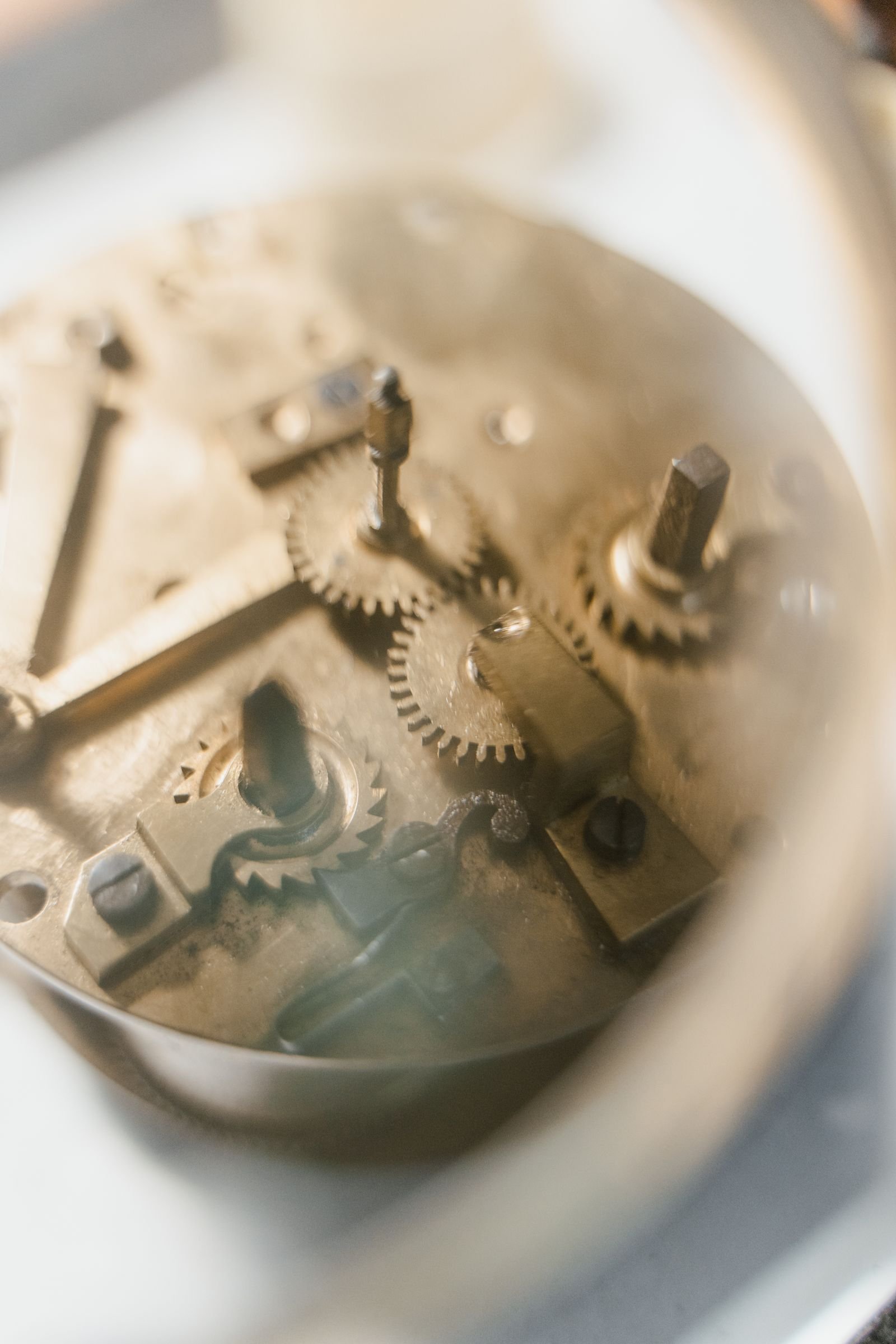 Close view of a mechanical escapement and gear train representing the 9SA5 Dual Impulse Escapement