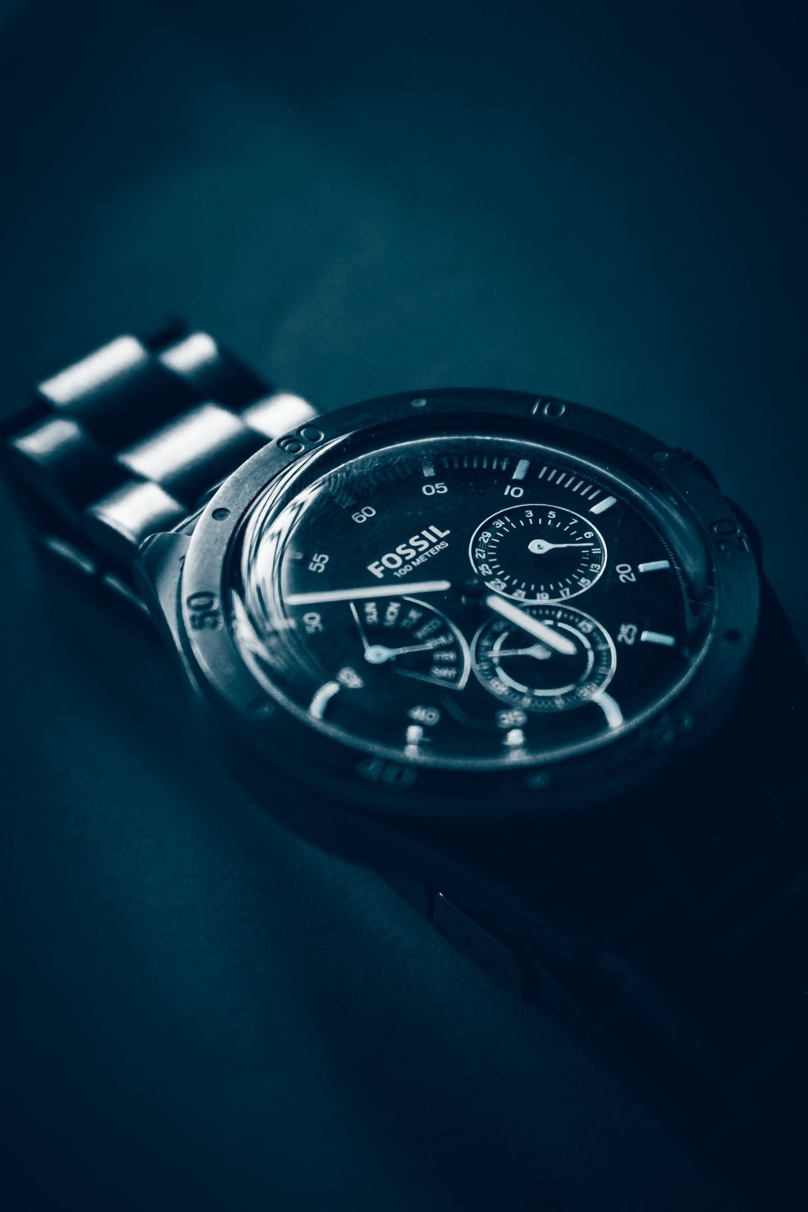 Automatic chronograph illustrating Omega Calibre 9900 winder settings